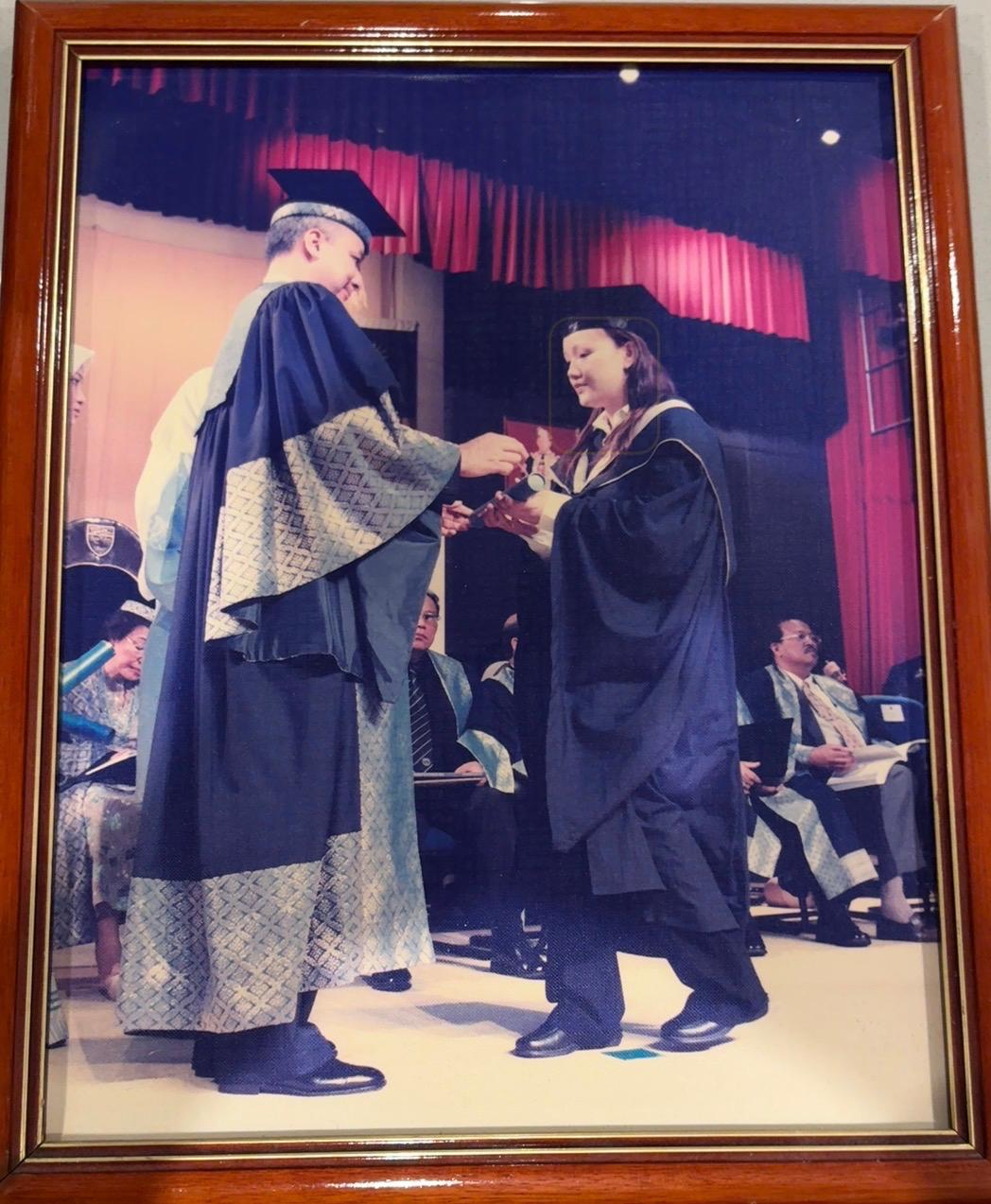 Huey receiving her nutrition qualification at graduation